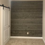 Reclaimed wood accent wall and barn door